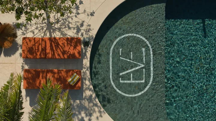 An overhead shot of the stylish rooftop pool at The Eve Hotel, Sydney