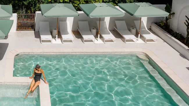 The outdoor mineral pool with spa and sun terrace at The Tamborine, Queensland