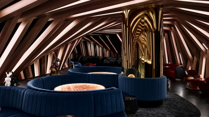 The edgy geometric interiors of Curious Bar and cosy booth-style seating at W Melbourne.