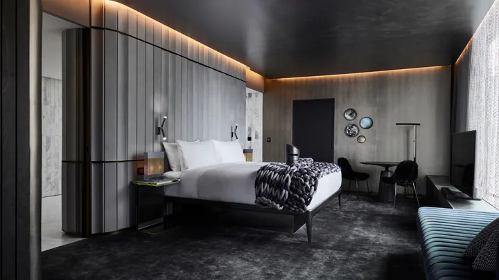 The dark, sleek interiors of the Extreme Wow bedroom suite at W Melbourne.