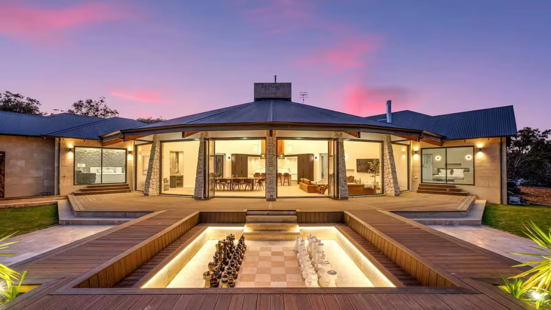 Exterior of Caves Manor, a Margaret River Airbnb for groups at dusk
