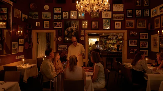 Corner 75 restaurant interior with red walls and memorabilia