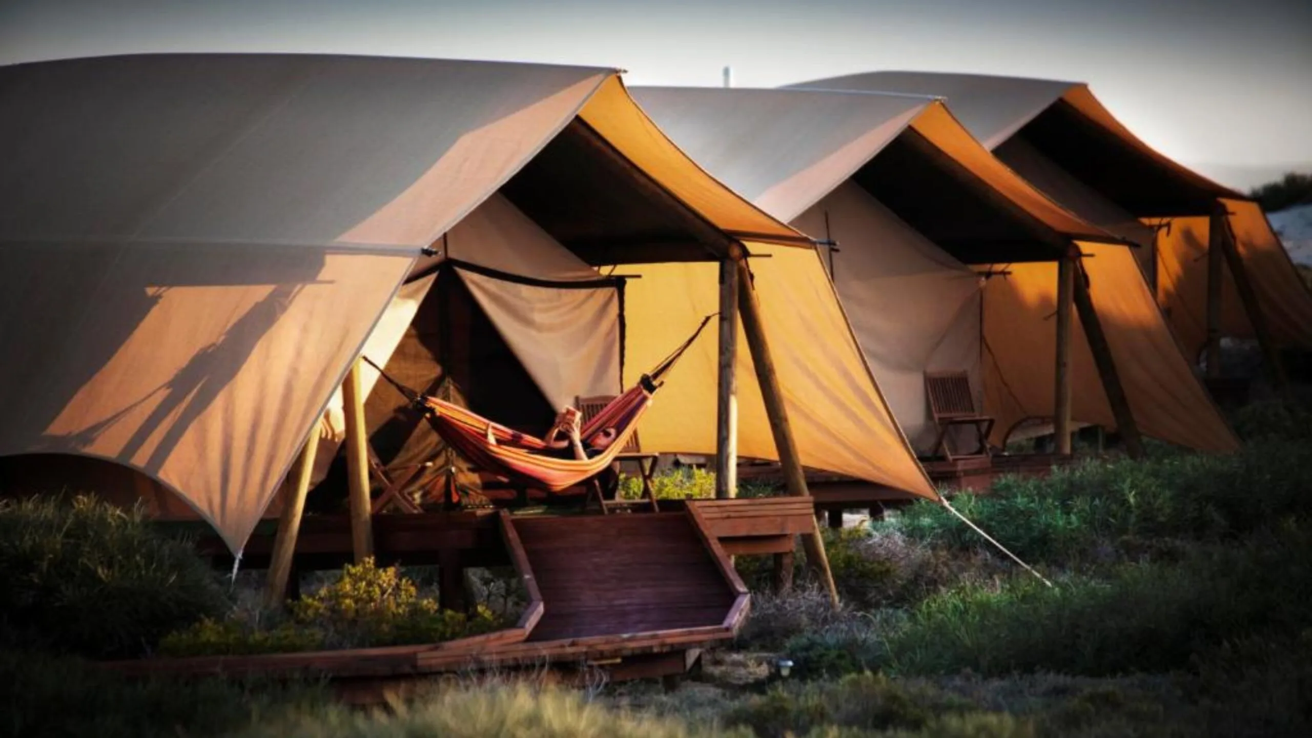 Glamp metres away from coastal coral reefs and lapping waters at Sal Salis.