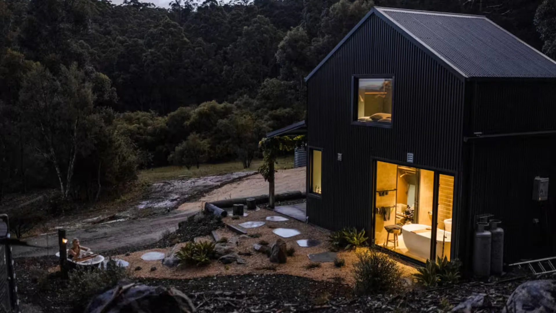 Wind down with a fire and an outdoor soak at Stillwood Retreat.