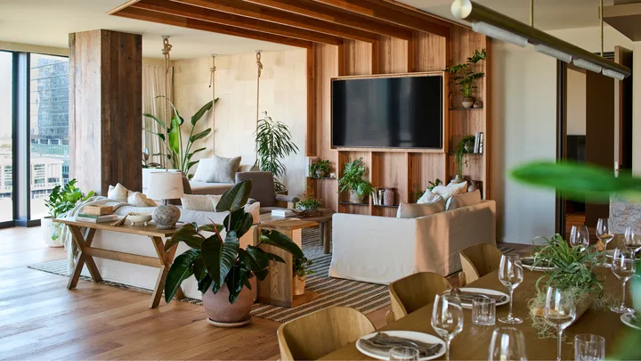 The spacious interior of a penthouse suite at 1 Hotel Melbourne.