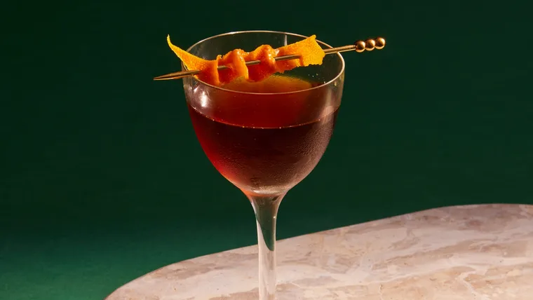 A photograph of Bobby Burbs cocktail made from blended Scotch Whiskey and vermouth