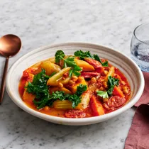 Spicy chorizo and chickpea braise with smoked almond romesco