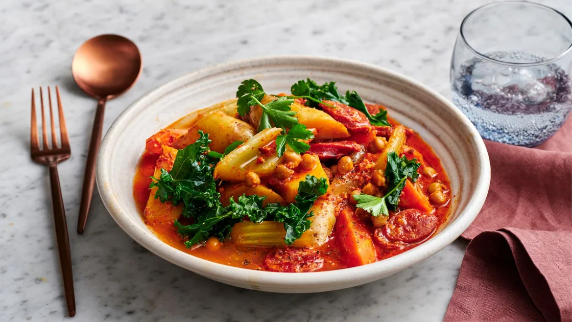 Spicy chorizo and chickpea braise with almond romesco recipe - Gourmet Traveller