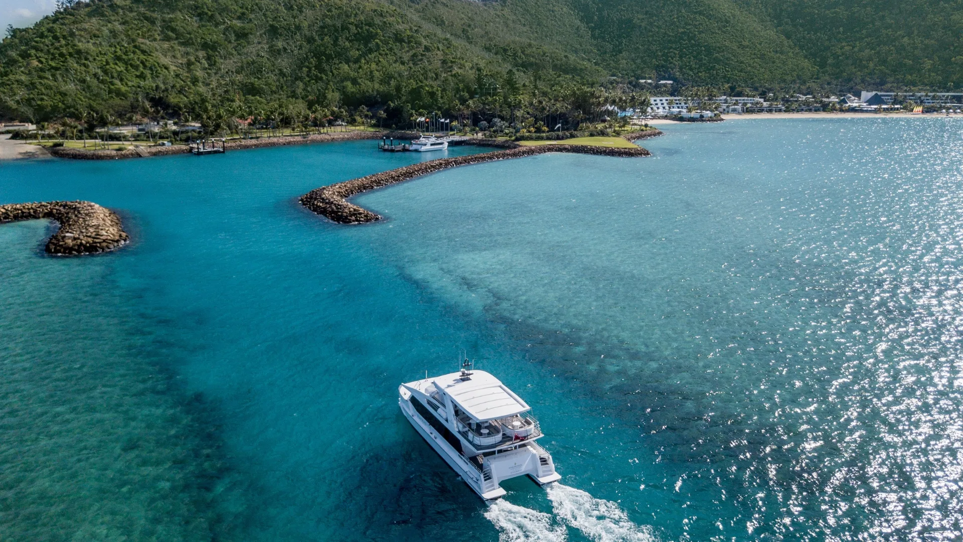 Boat transfer arriving at luxury Hayman Island resort, Intercontinental Hayman Great Barrier Reef