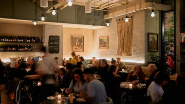 A moody shot of the interiors of Molli bistro in full swing.