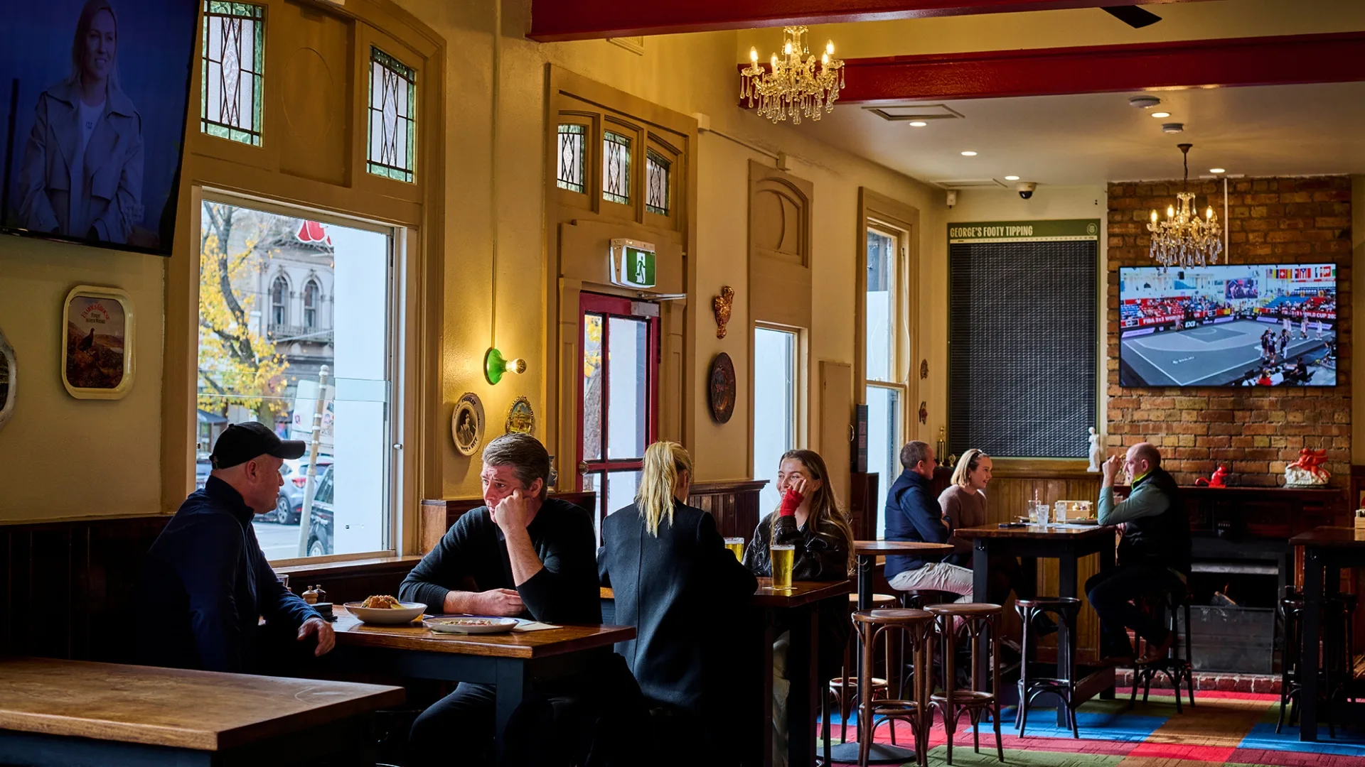 People sitting in the revamped The George Hotel South Melbourne pub