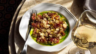 Crudo and white wine at Postino Osteria in Summer Hill