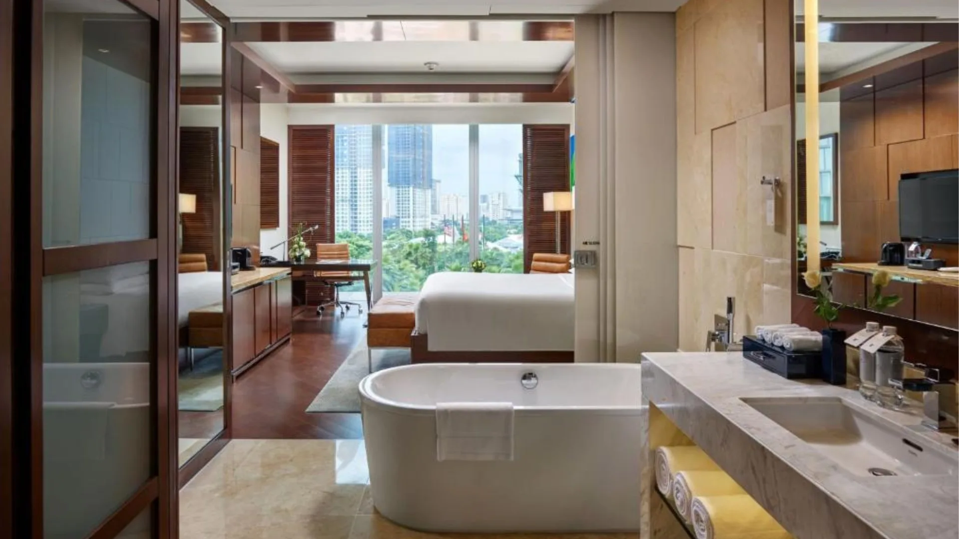 One of JW Marriot Hotel Hanoi's 450 luxurious suites with a separate bathtub 