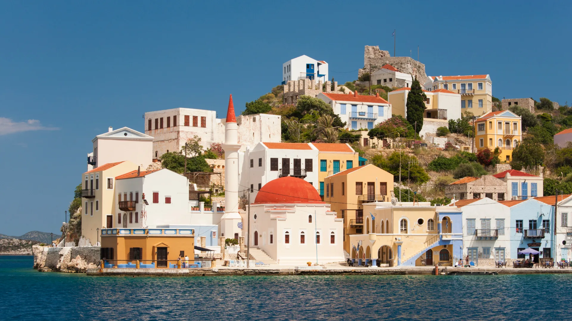 Most easterly and remote of the Dodecanese Islands, Kastellorizo lies in the Mediterranean just off the Turkish coast. Colourful Kastellorizo Village, its main settlement, is built around a picturesque U-shaped harbour.
