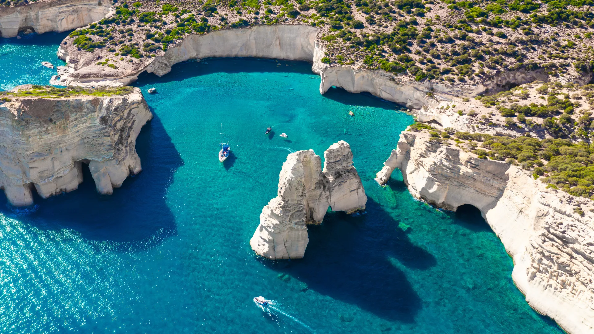 Kleftiko Bay, a scenic attraction with white volcanic rocks and caves. One of the most visited places on the island. Milos Island, Greece.