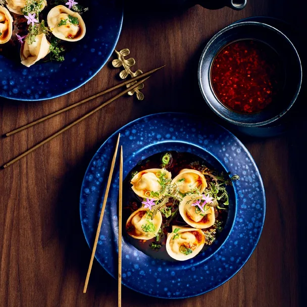 Steamed tiger prawn and scallop dumplings with XO dressing