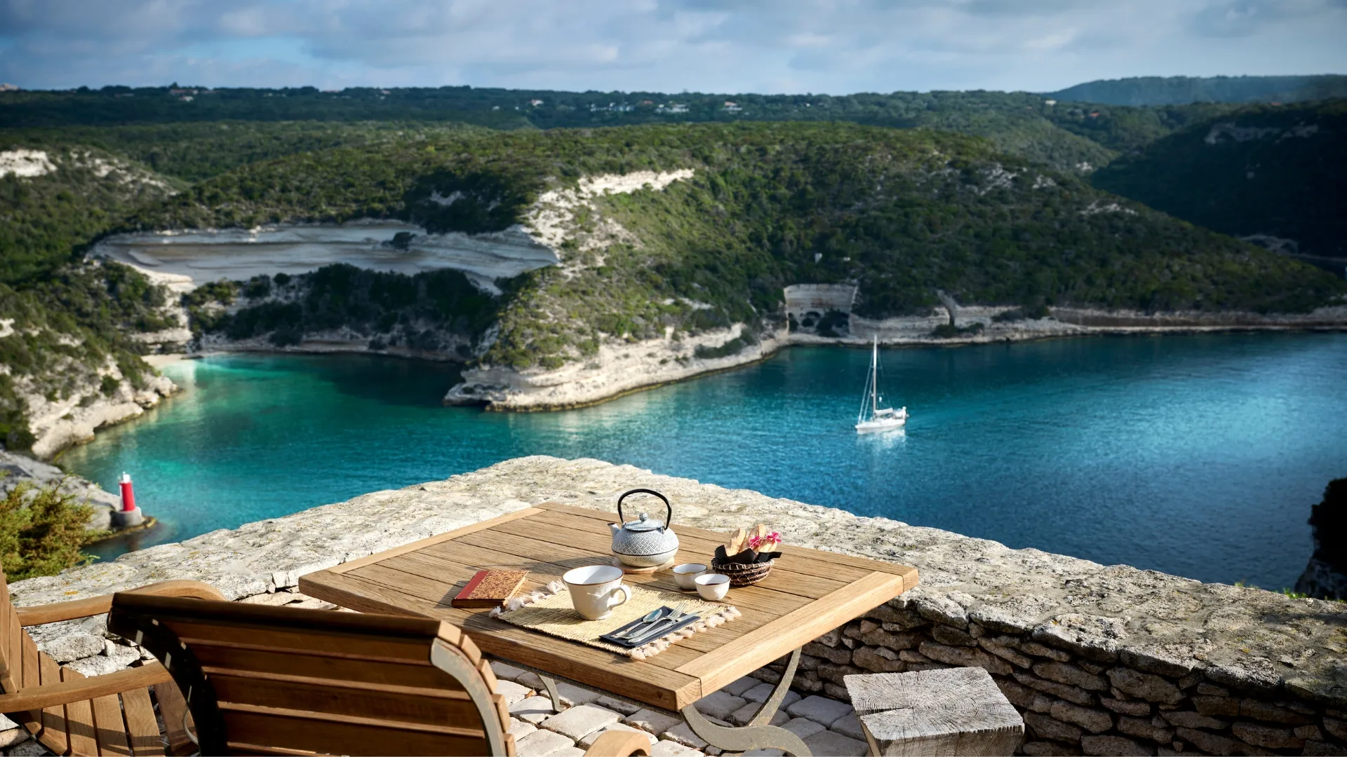 Breakfast views of craggy cliffs and jewel-blue water 