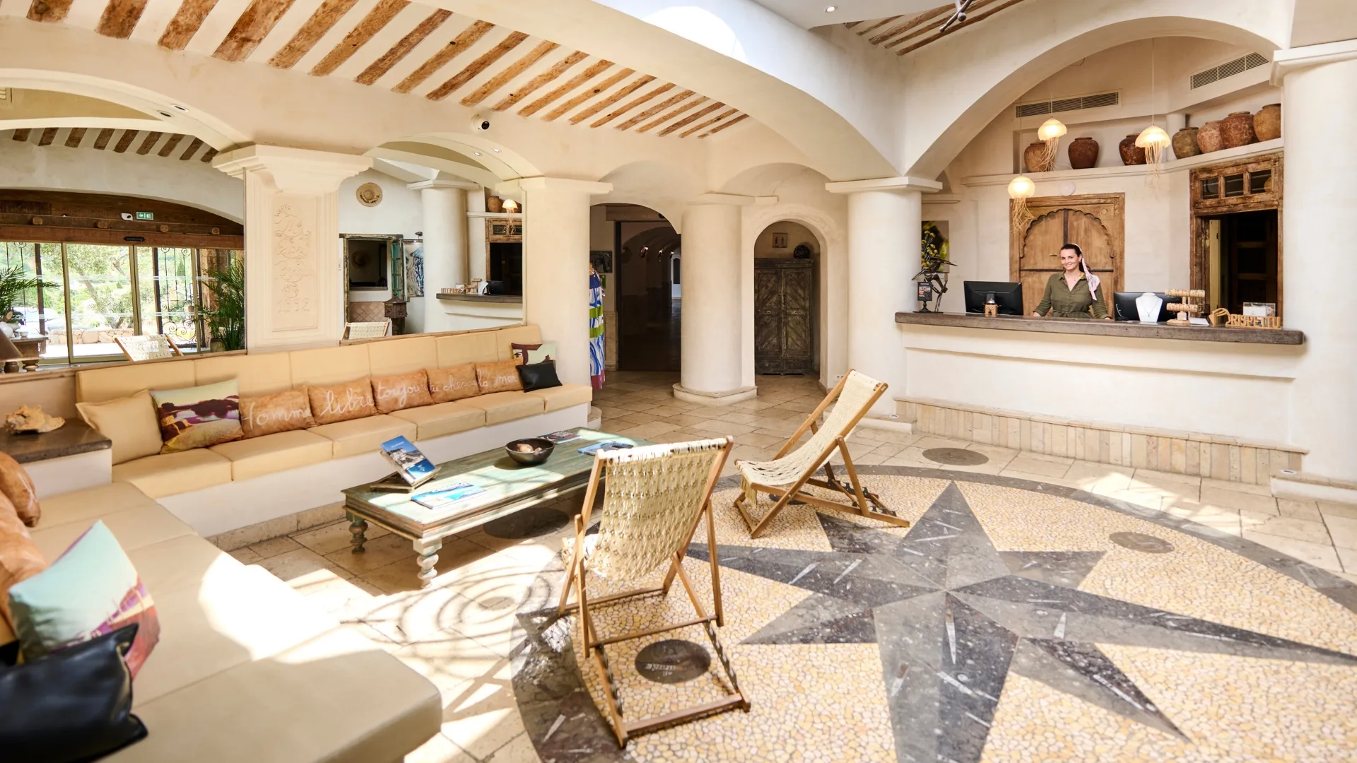 The bright and airy hotel lobby of hotel U Capu Biancu, Bonifacio, Corsica