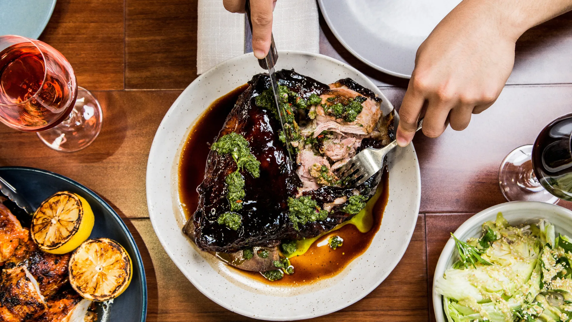 Slow cooked lamb shoulder with side dishes