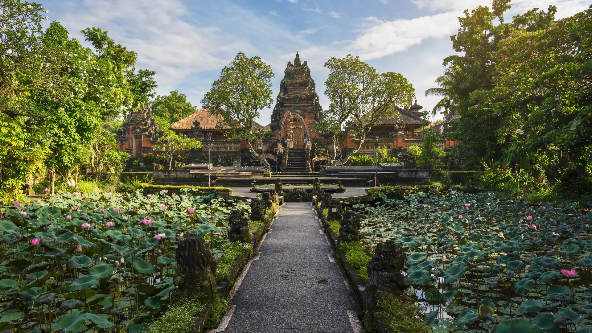Lotus pond and Pura Saraswati temple in early morning, Ubud, Bali, Indonesia.