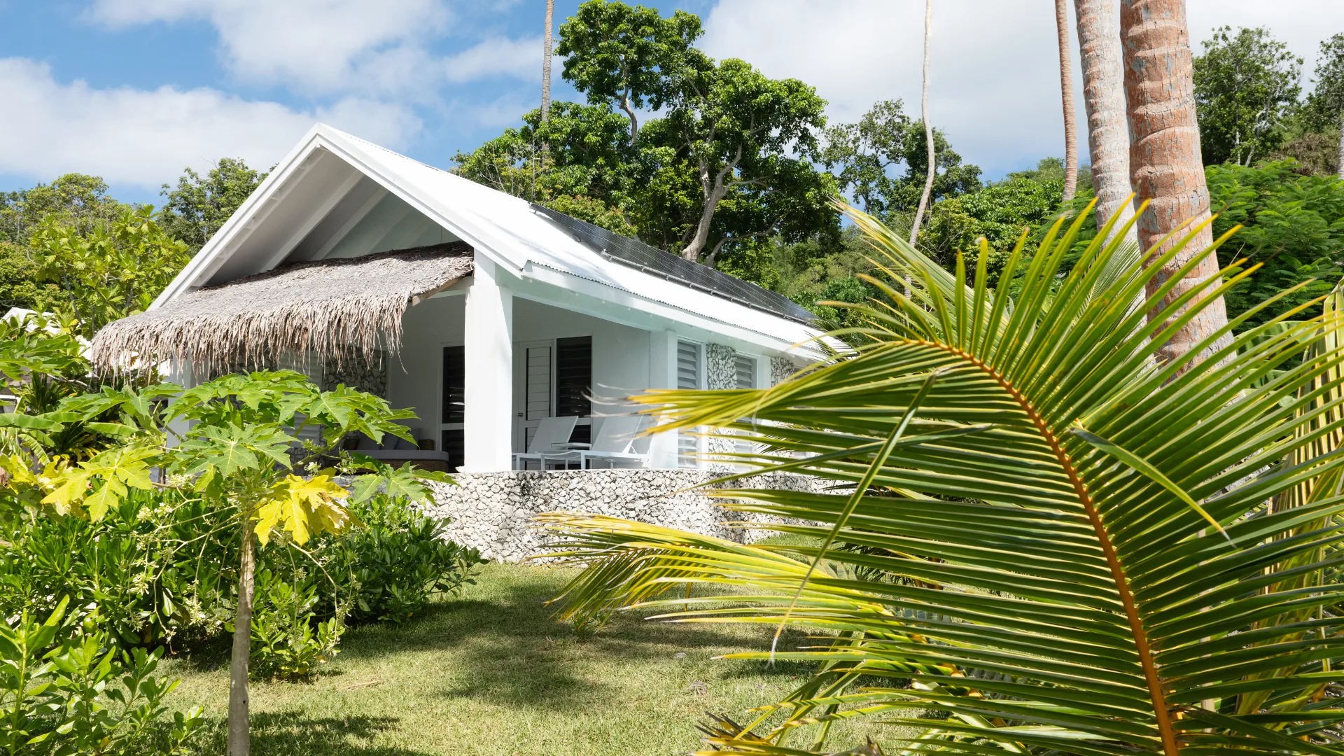 A villa surrounded by lush garden at The Moso resort in Vanuatu