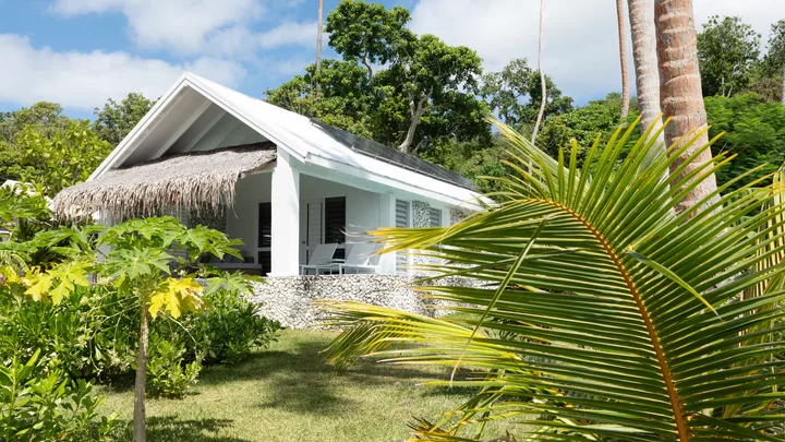 A villa surrounded by lush garden at The Moso resort in Vanuatu