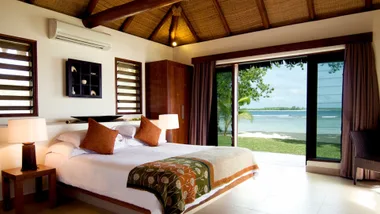 Spacious bedroom with ocean views at Eratap Beach Resort Vanuatu