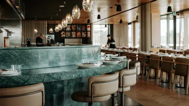 The curved green marble bar at Adelaide restaurant Yakisan