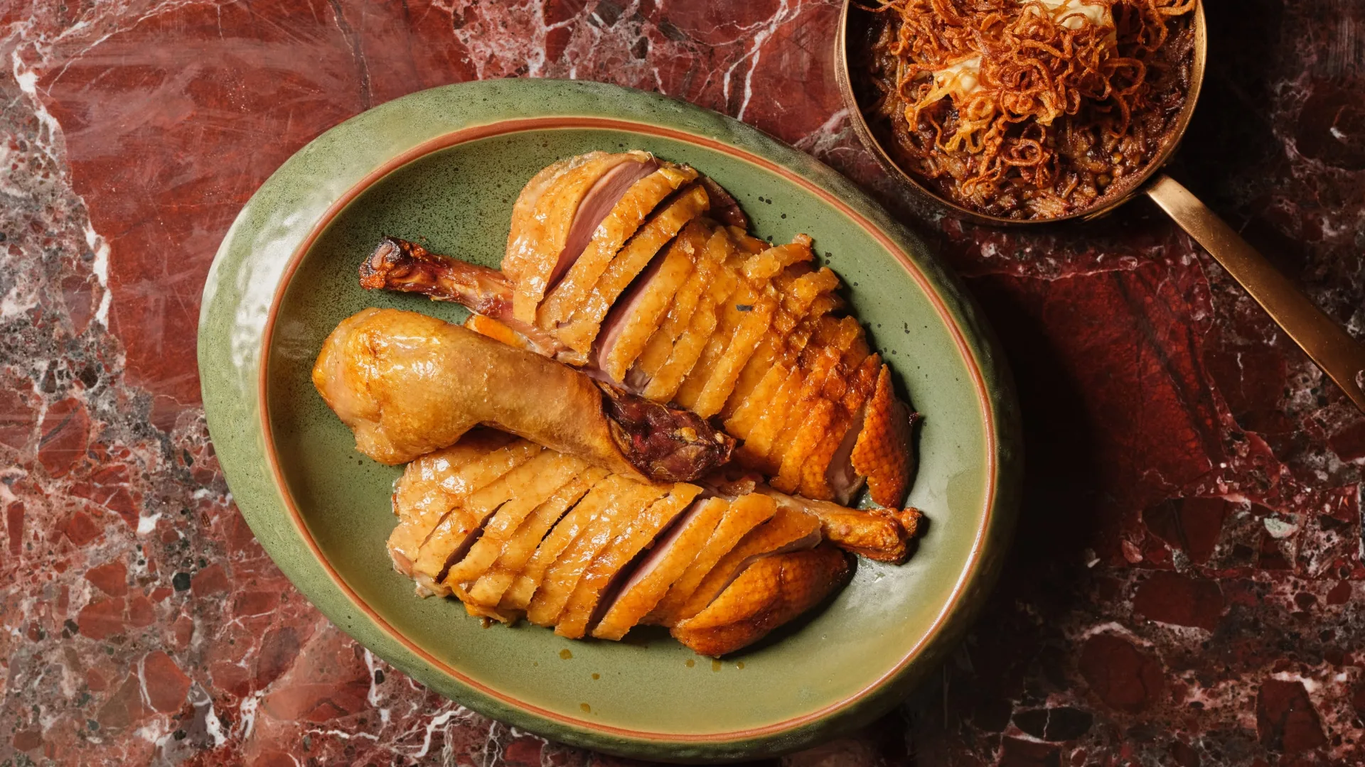 Dry-aged carob duck crown at Rose Bay's Aambra