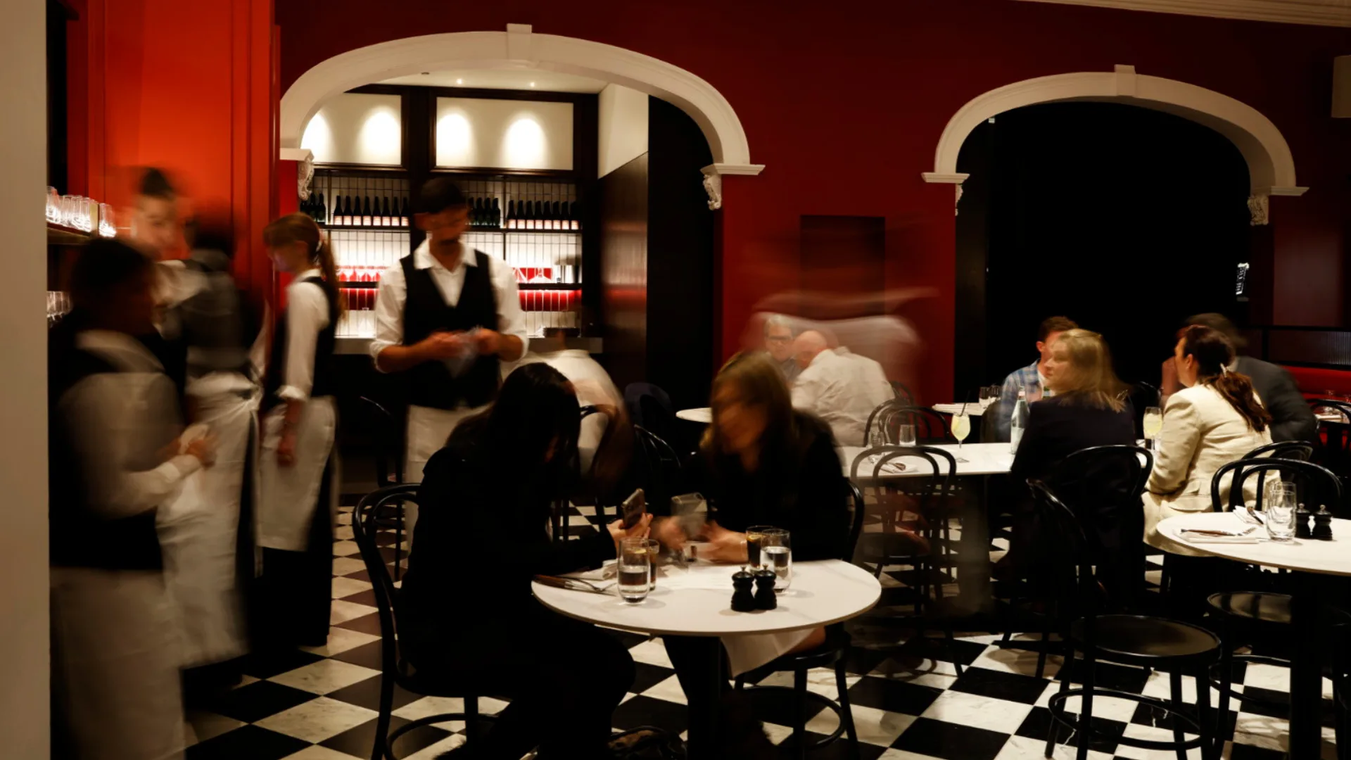 The red-walled dining room of new Melbourne steak frites restaurant 7 Alfred