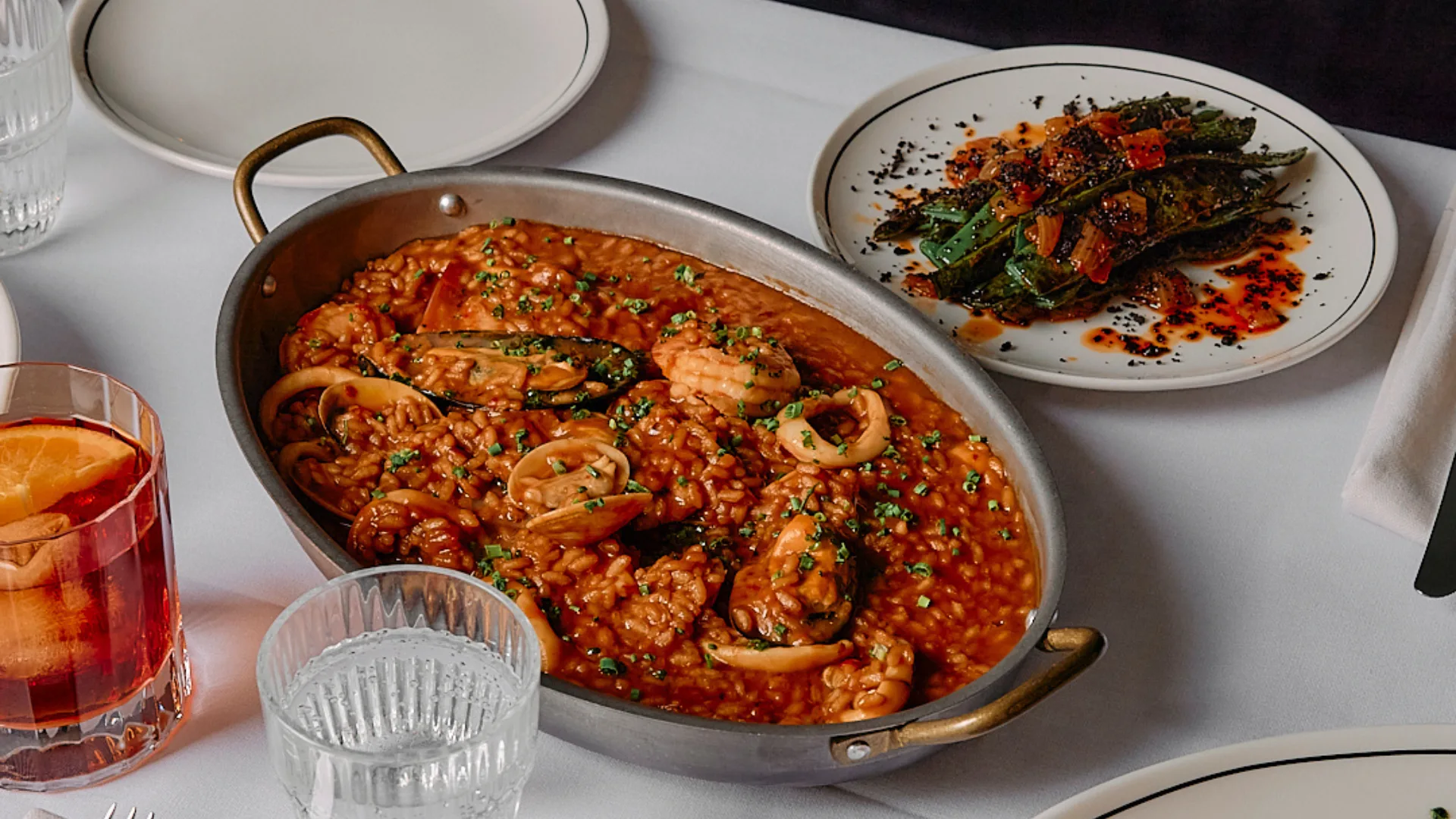 A plate of seafood paella at new Sydney restaurant Alzado in Bondi
