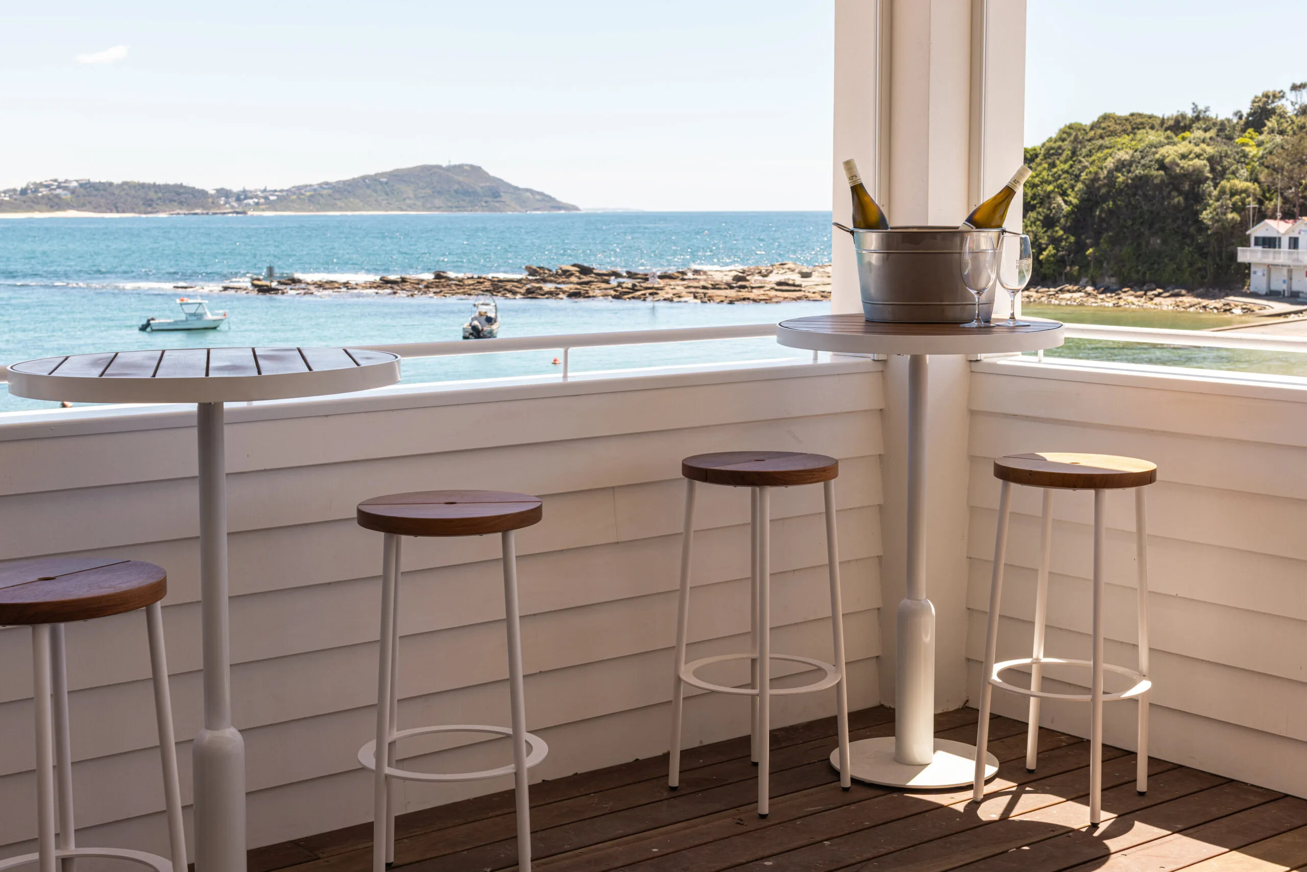 High tables on the wraparound deck at Terrigal Pavilion