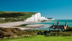 Wicked for good filming location the seven sisters white cliffs over a blue sea