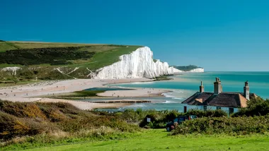 Wicked for good filming location the seven sisters white cliffs over a blue sea