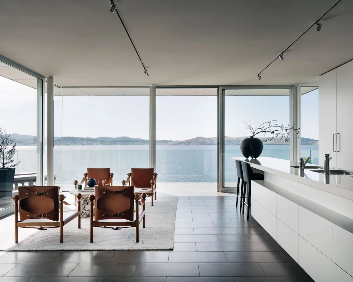 Looking over the Derwent River from an architect-designed Airbnb with contemporary styling.