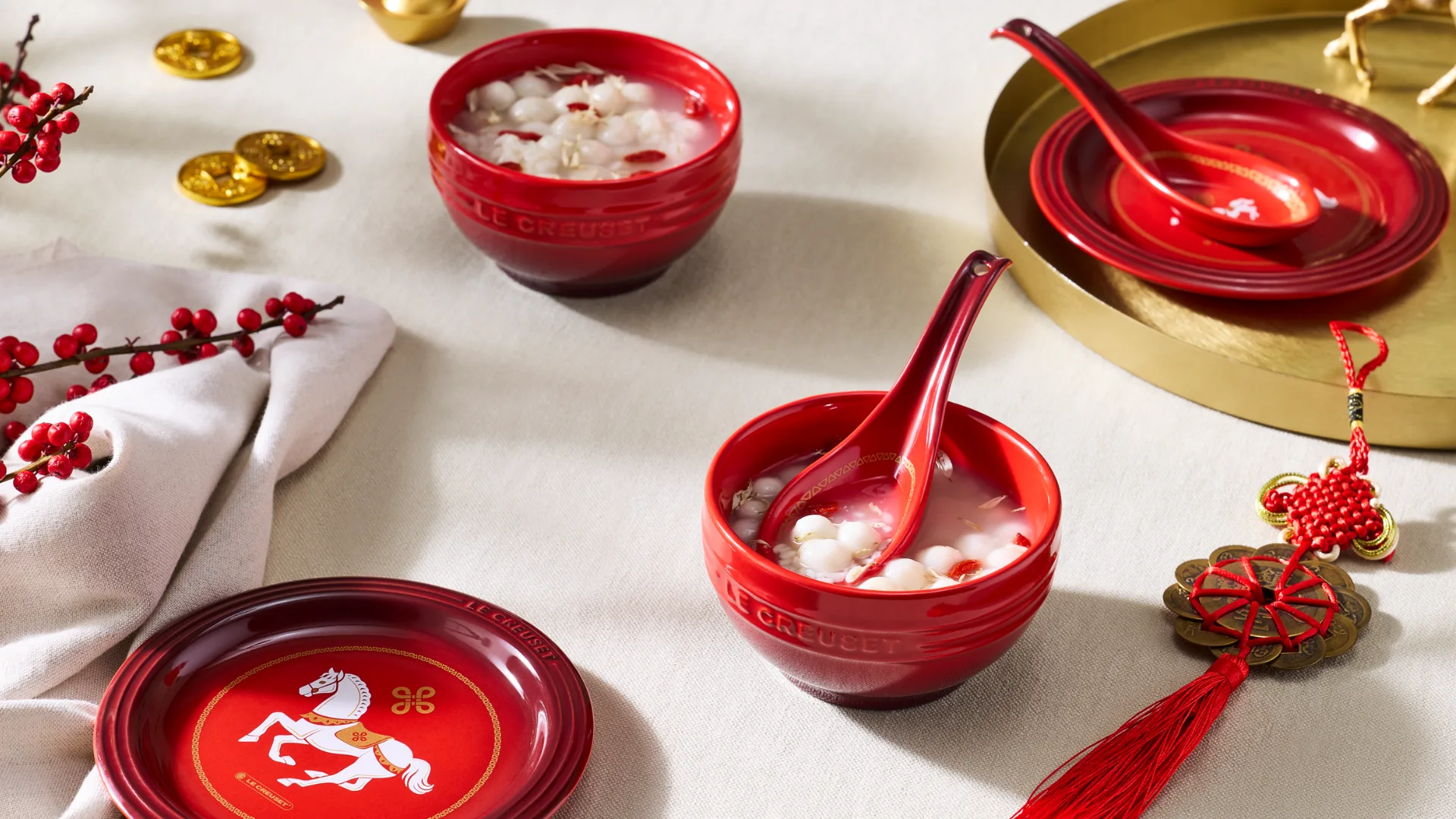 A table setting using the Le Creuset Lunar New Year carousel collection