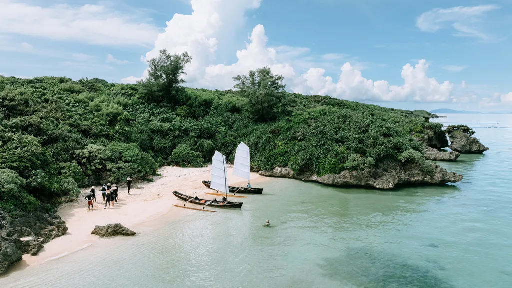 Aerial view of sailing boats on secluded tropical beach, Ishigaki Island of Yaeyama Islands, Okinawa, Japan