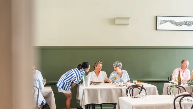 The convivial dining room inside a heritage primary school at Staguni