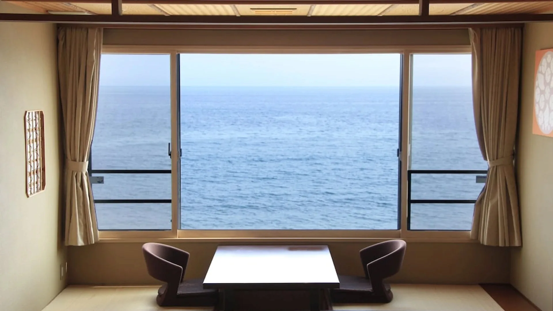 Japanese-style rooms come with calming ocean views at Heiseikan Shiosaitei Hanatsuki.