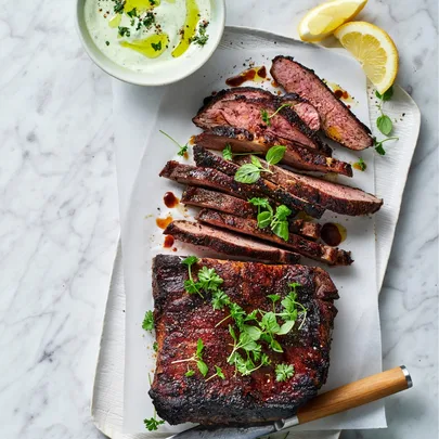 Barbecued butterflied lamb leg with green fattoush and mint yoghurt
