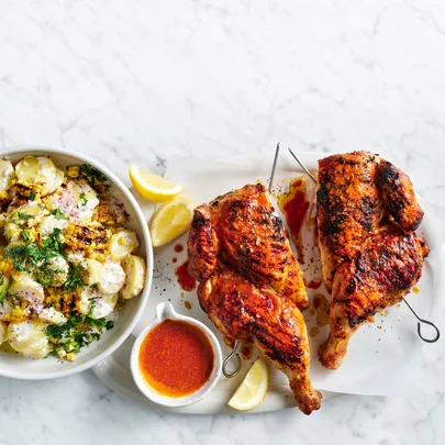 Peri peri char-grilled chicken with potato and corn salad