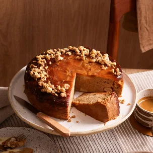 Upside-down caramel apple cake topped with a hazelnut strudel crumb
