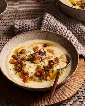 Apple and celeriac soup with cheese and bacon croûtons