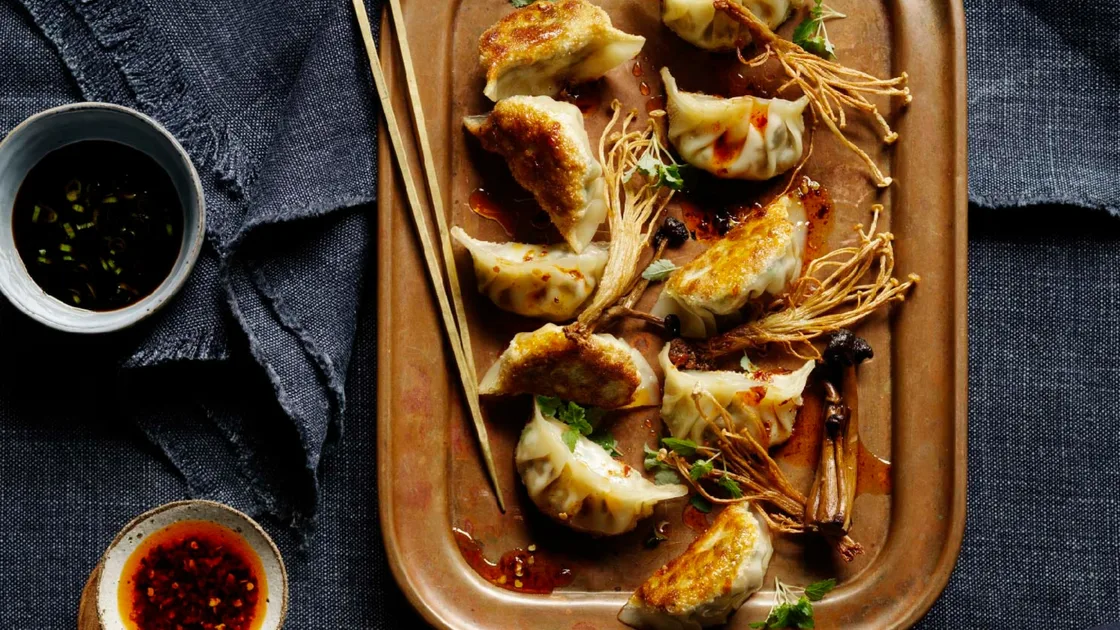 Mushroom gyoza with frizzled enoki mushrooms