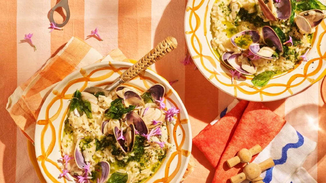 Pipi risotto with basil butter