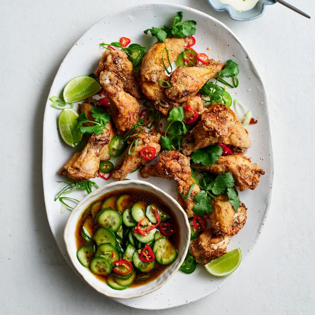 Salt and pepper chicken drumettes with cucumber salad