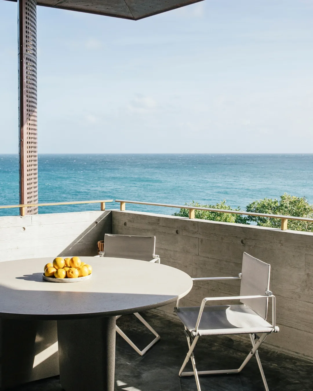 The balcony at The House at Lizard Island is a sea of shifting blues 