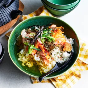 King salmon ochazuke, a comforting bowl of steamed rice steeped in green tea or dashi broth with savoury toppings