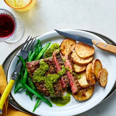 Seared flank steak with roast potatoes and vadouvan curry butter