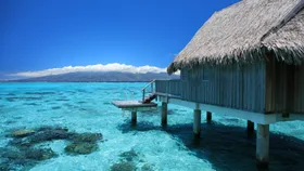 Sofitel Kia Ora Moorea Beach over glistening waters
